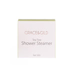Grace & Gild Tea Tree Shower Steamer in a square white box with a pale green top edge, on a plain white background.