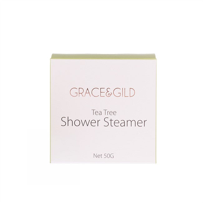 Grace & Gild Tea Tree Shower Steamer in a square white box with a pale green top edge, on a plain white background.