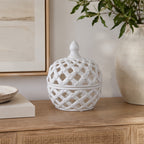 Gracious Living Ascot Braid Ceramic Jar with Lid in white, styled on a console with an open lattice design and decorative lidded top.