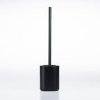 A minimalist black toilet brush with a slim handle and a matte cylindrical base, shown on a clean white background.