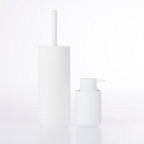White soft touch toilet brush and matching soap dispenser displayed together on a white background.