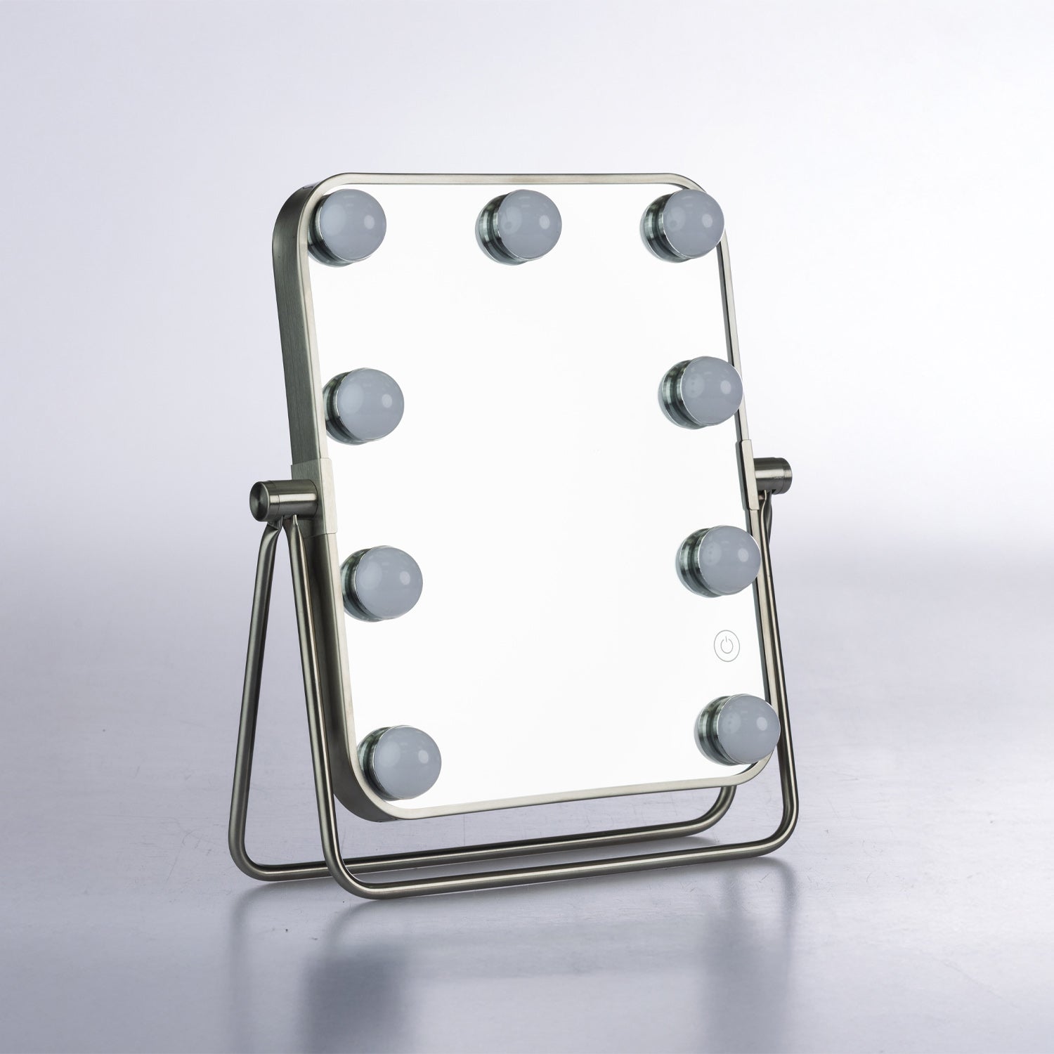 LED tabletop vanity mirror with nine globe lights, silver frame and adjustable stand.