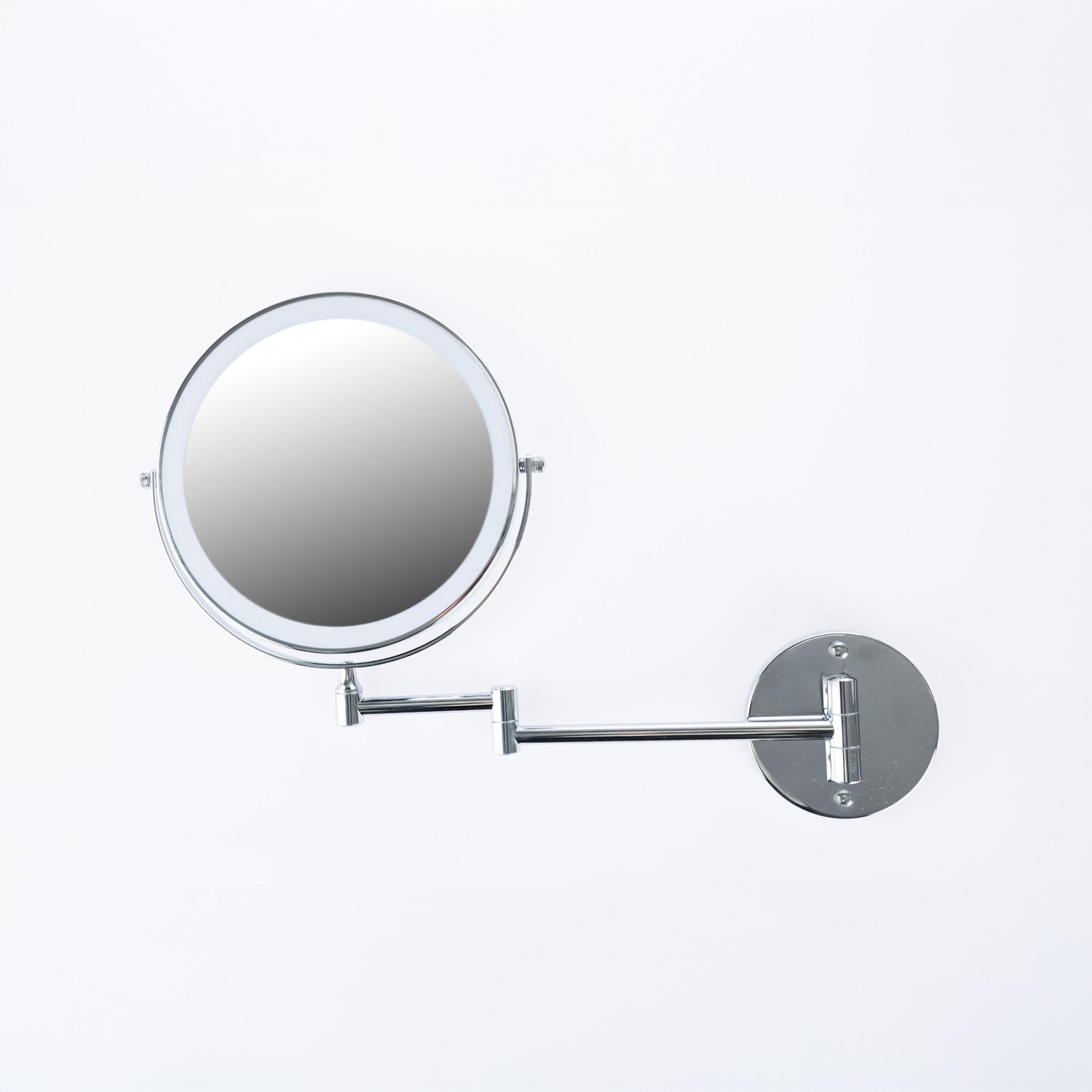 Solace Gigi LED wall-mounted round magnifying mirror in a polished silver finish with an adjustable swing arm.