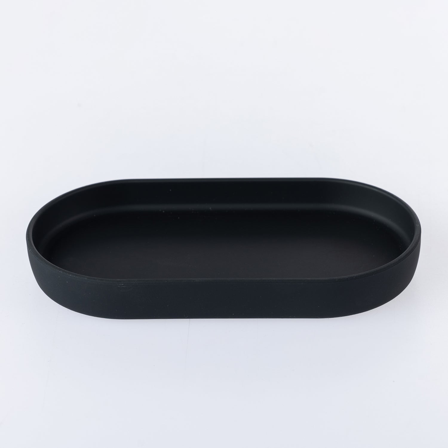Black oval bathroom tray with a smooth matte finish, designed for organising soap dispensers, toothbrush holders, and other bathroom essentials.
