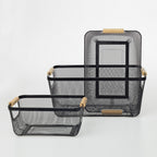 Home Essentials Cassius black metal mesh storage basket collection with small, medium and large baskets, featuring natural wooden handles.
