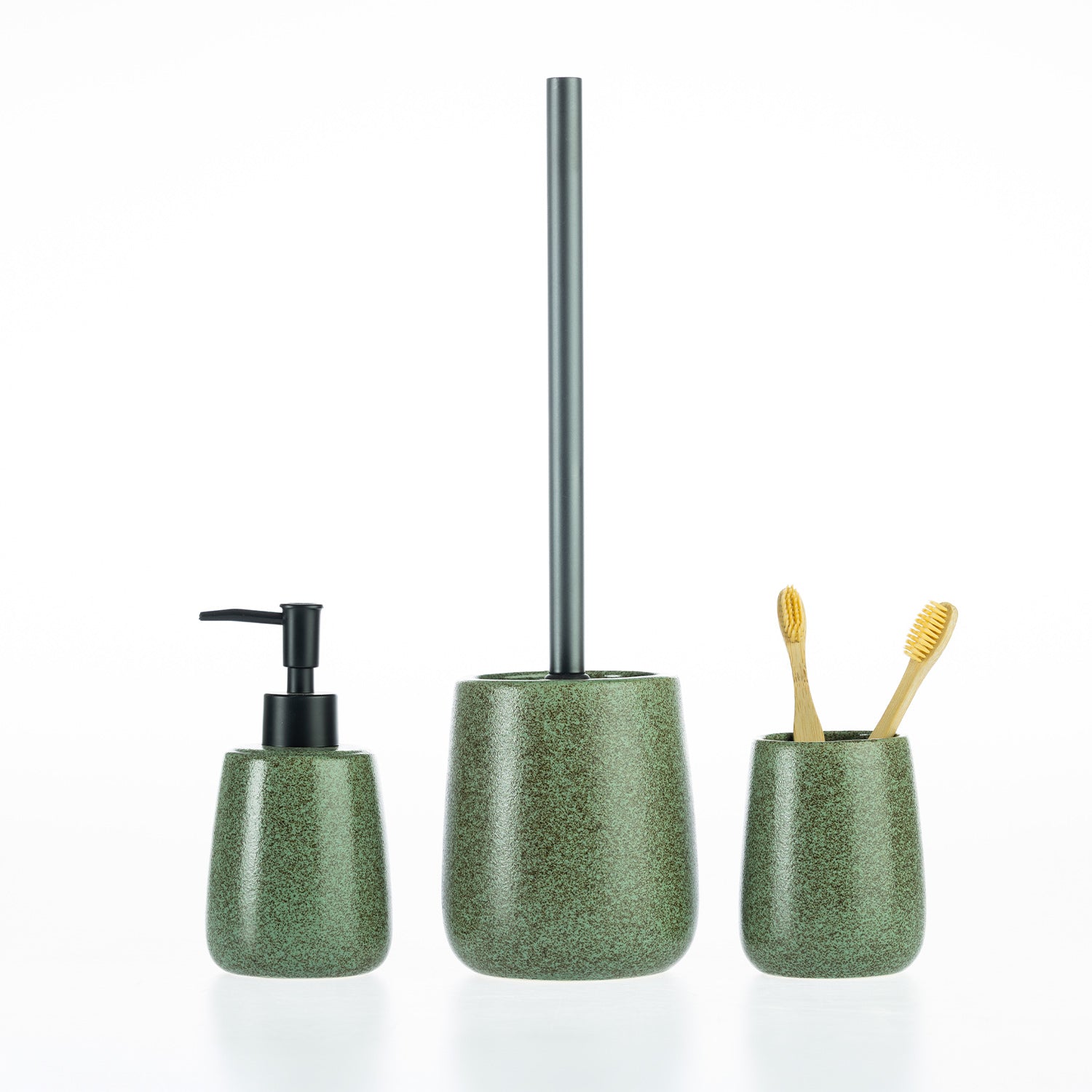 Green speckled bathroom accessories set including a soap dispenser, toilet brush holder, and tumbler with toothbrushes.