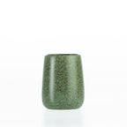 Green speckled bathroom tumbler with a rounded stoneware-style design, ideal for holding toothbrushes and bathroom essentials.
