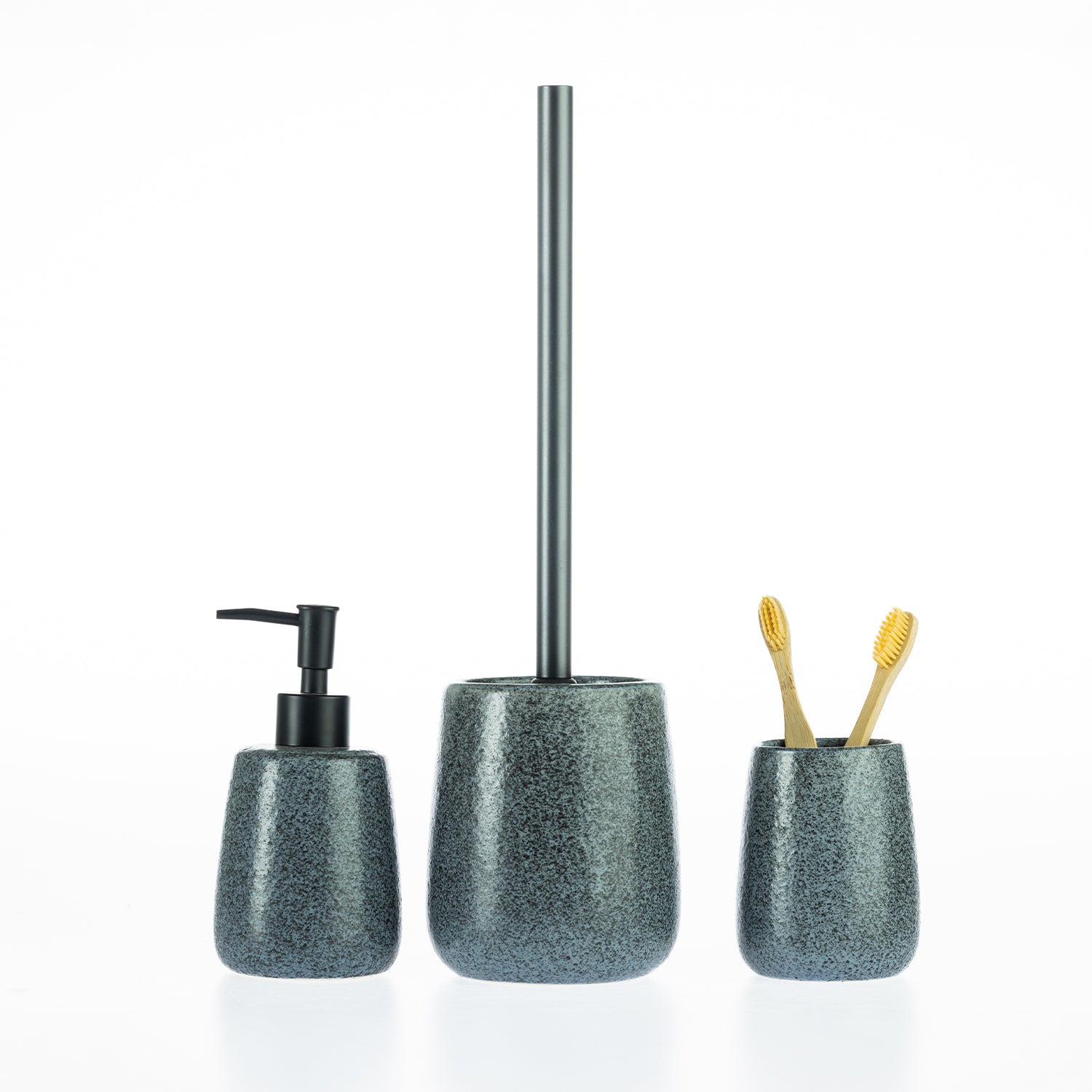 Charcoal speckled bathroom accessories set including a soap dispenser, toilet brush holder, and tumbler with toothbrushes.