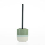 Design Republique Kaikoura Fade toilet brush holder featuring a stoneware construction with a speckled reactive glaze, layered green and cream finish, and coordinating handle.