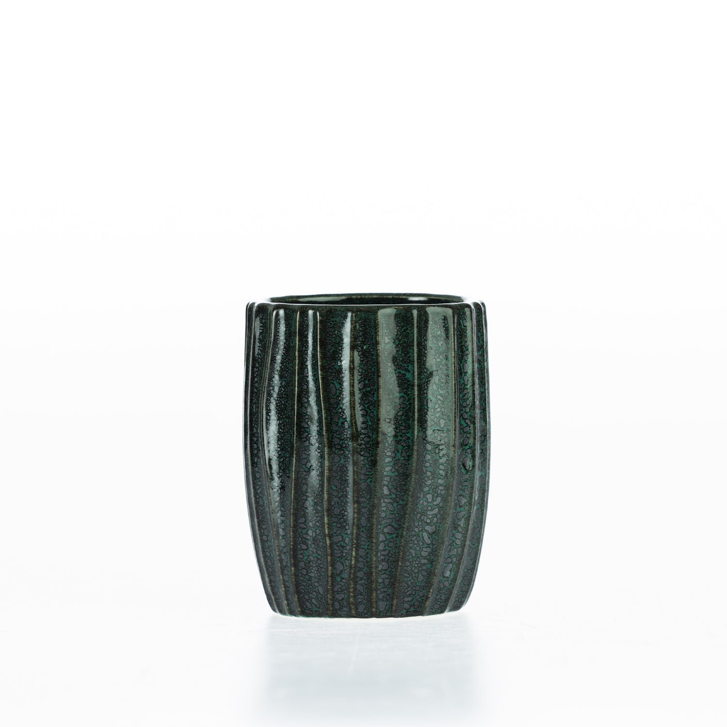 Fieldcrest Aoraki tumbler in glazed stoneware with a textured ribbed design and glossy finish, ideal for storing toothbrushes or bathroom essentials.