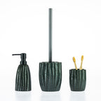 Fieldcrest Aoraki bathroom accessories collection featuring a matching soap dispenser, toilet brush holder, and tumbler in a textured ribbed stoneware design with a glossy glazed finish.