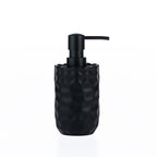A matte black soap dispenser featuring a softly textured, scalloped stoneware body and sleek black pump.