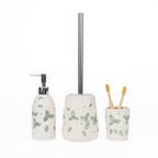Gracious Living Irina Floral bathroom accessory range in Ivory, including a soap dispenser, toilet brush holder, and tumbler with a soft green floral pattern and glossy ceramic finish.