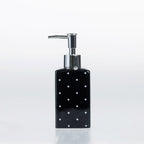 Design Republique Spotty Ceramic Soap Dispenser in Black with white dot detailing and a chrome-look pump.