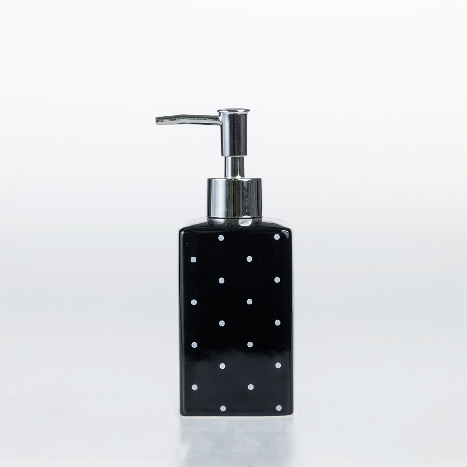 Design Republique Spotty Ceramic Soap Dispenser in Black with white dot detailing and a chrome-look pump.