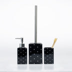 Design Republique Spotty Ceramic Bathroom Accessories in Black, featuring a coordinating soap dispenser, toilet brush holder and tumbler with white spot detailing.
