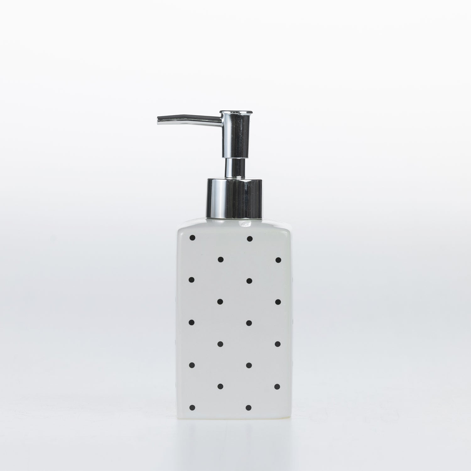 Design Republique Spotty Ceramic Soap Dispenser in White with black dot detailing and a chrome-look pump.