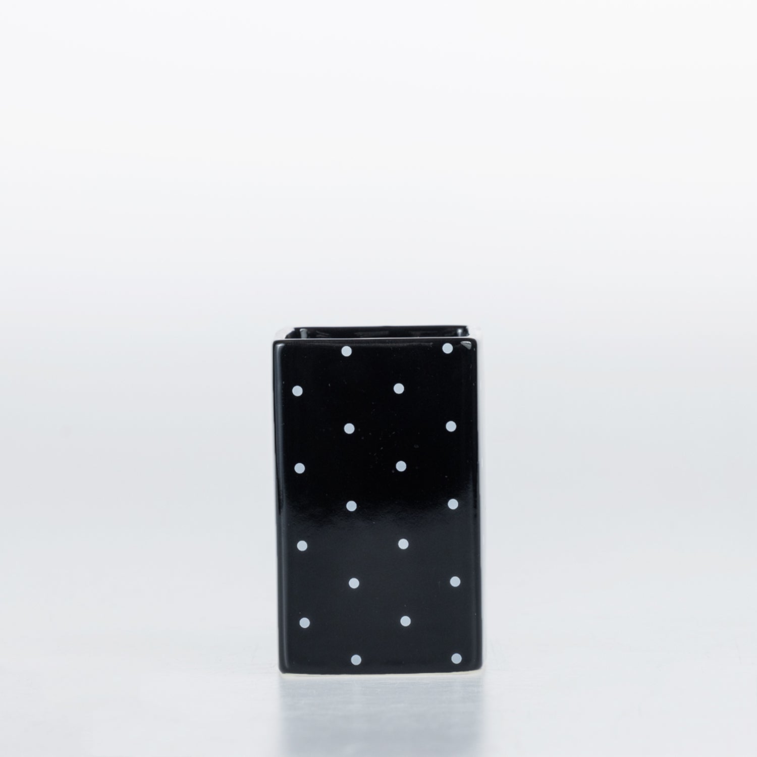 Design Republique Spotty Ceramic Tumbler in Black with white dot detailing.