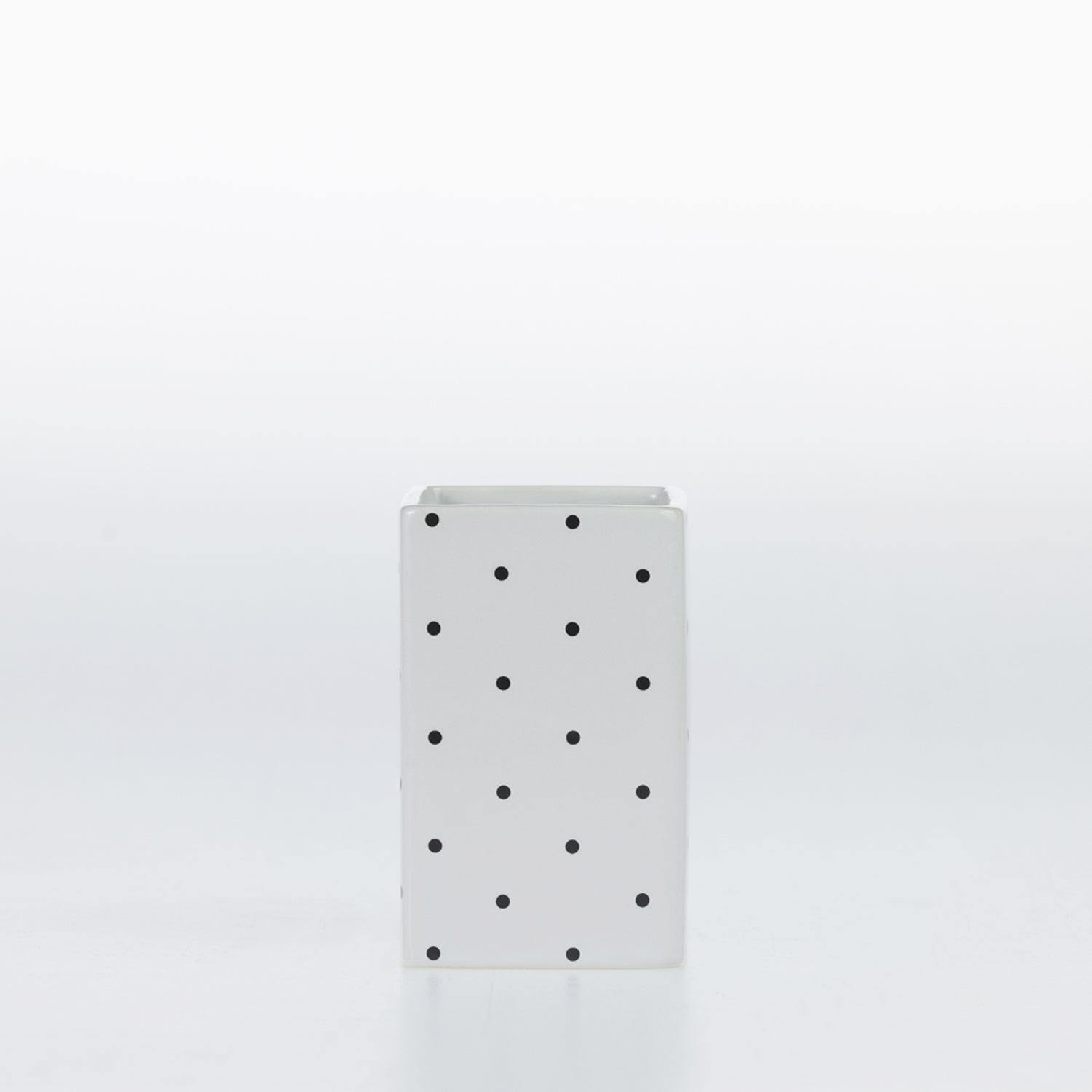 Design Republique Spotty Ceramic Tumbler in White with black dot detailing.