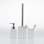Design Republique Spotty Ceramic Bathroom Accessories in White, featuring a coordinating soap dispenser, toilet brush holder and tumbler with black spot detailing.