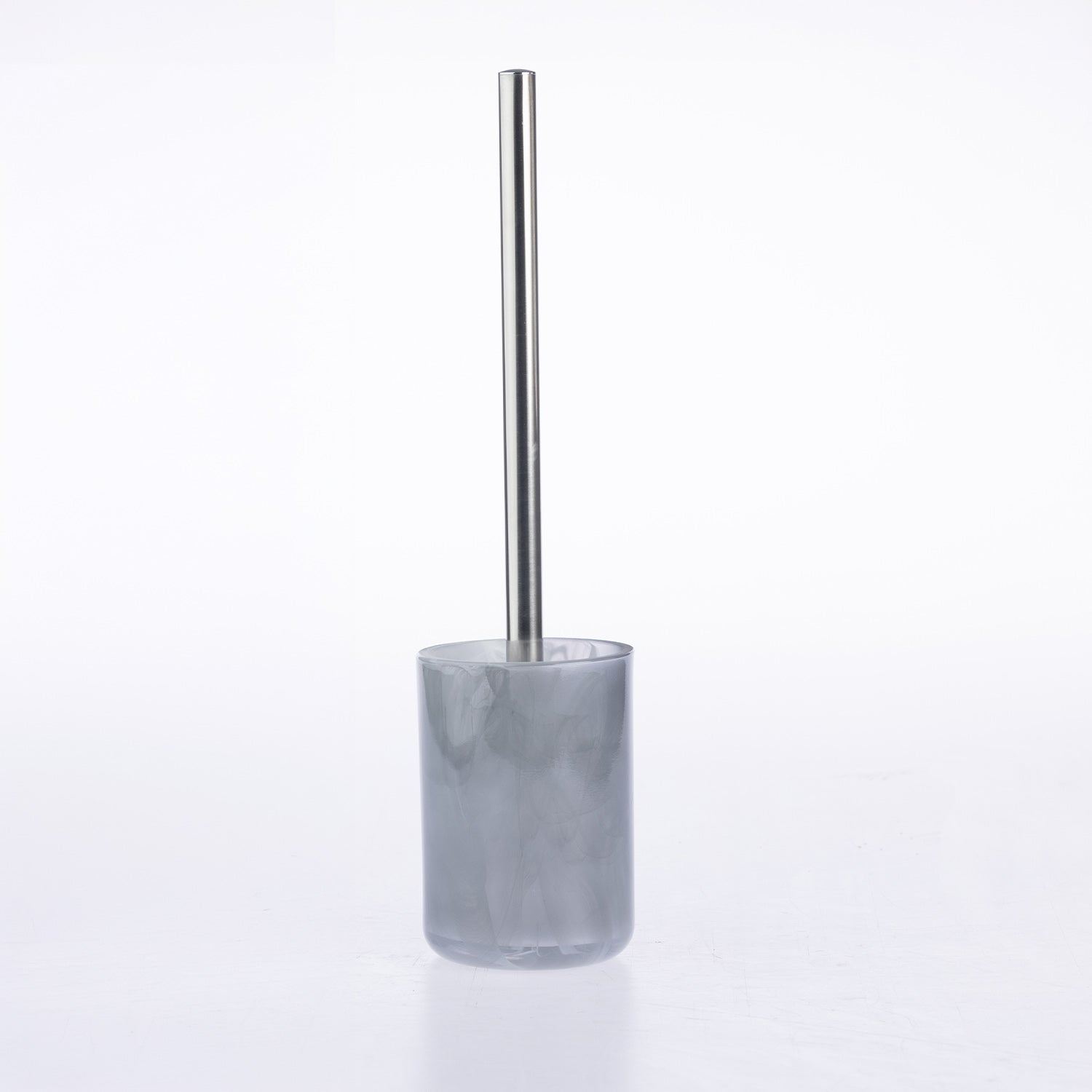 A modern toilet brush with a brushed silver metal handle and a translucent smoky gray acrylic holder, shown on a seamless white background.