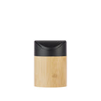 Compact mini waste bin featuring a natural bamboo body and contrasting black swing-style lid, designed for convenient disposal in smaller spaces.