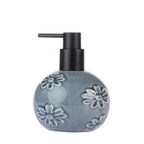 Gracious Living Vera Floral Soap Dispenser in Denim, featuring a rounded glazed ceramic design with raised floral detailing and a black pump.