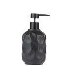 Design Republique Neva Ceramic Soap Dispenser in Black, featuring a textured faceted finish with a matte black pump.