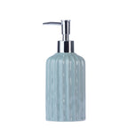 Design Republique Blake Soap Dispenser in Sea Mist, featuring a glossy light blue textured finish and chrome pump on a white background.