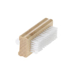A wooden nail brush with white bristles on a white background