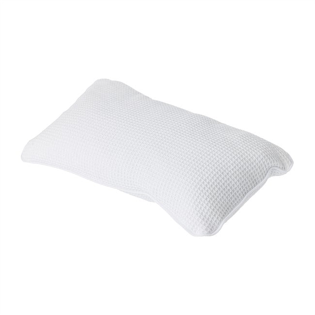 A white textured pillow with a waffle or honeycomb fabric pattern, shown on a plain white background.