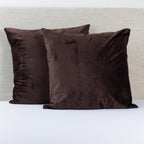 Design Republique Velvet Euro Pillowcase Pair in Chocolate, featuring two rich dark brown velvet pillowcases with a soft plush finish, styled against a neutral upholstered headboard.