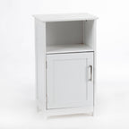 A white bathroom storage cabinet with an open upper shelf, paneled cupboard door, and brushed metal handle offers a classic blend of display and concealed storage.