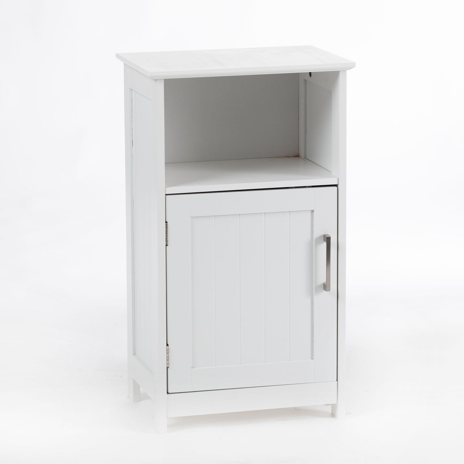 A white bathroom storage cabinet with an open upper shelf, paneled cupboard door, and brushed metal handle offers a classic blend of display and concealed storage.