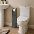 Grey toilet roll holder with enclosed cupboard placed beside a white toilet and basin in a bathroom.