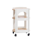 Back view of the Solace Parker 3 Tier Trolley in white and natural, showing the open curved frame, three shelves and caster wheels.