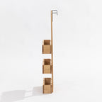 A three-tier wooden over door storage shot in a studio setting side view. 