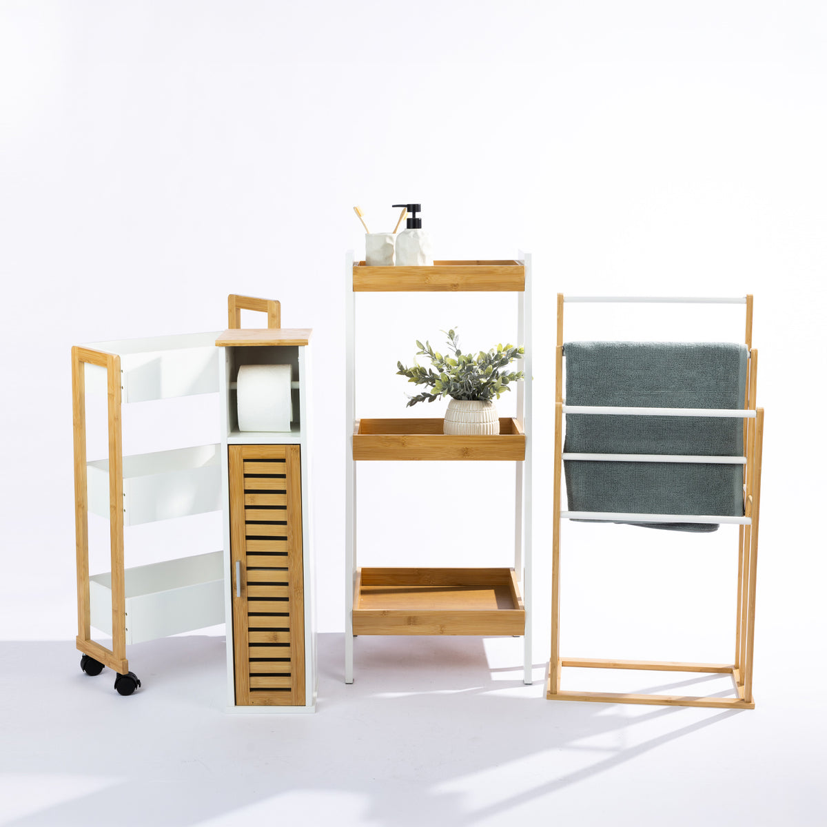 Solace Patten 3 Tier Shelf in White Natural, displayed with bathroom accessories and greenery alongside coordinating bamboo bathroom storage furniture and a towel rail.