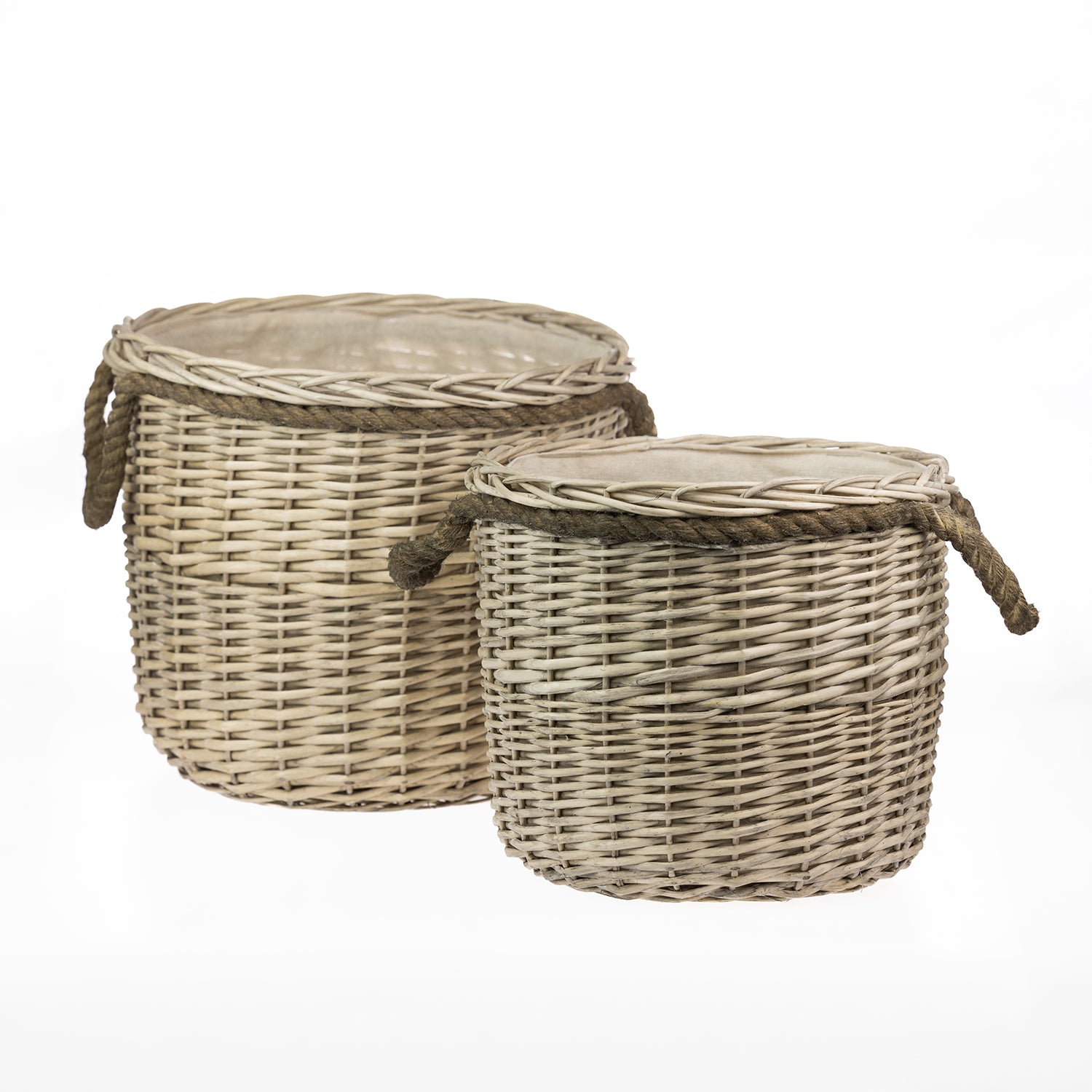 Set of two round wicker storage baskets in natural woven wicker with rope handles and fabric-lined interiors, displayed against a light grey background.