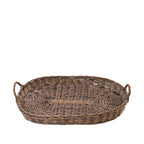 Design Republique Haven Tray Medium in Natural, featuring an oval woven design with raised sides and integrated loop handles.