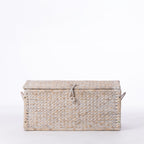 Cove Ruthie Basket Large in White Wash, featuring a rectangular woven design with a fitted lid, side handles and front loop closure.