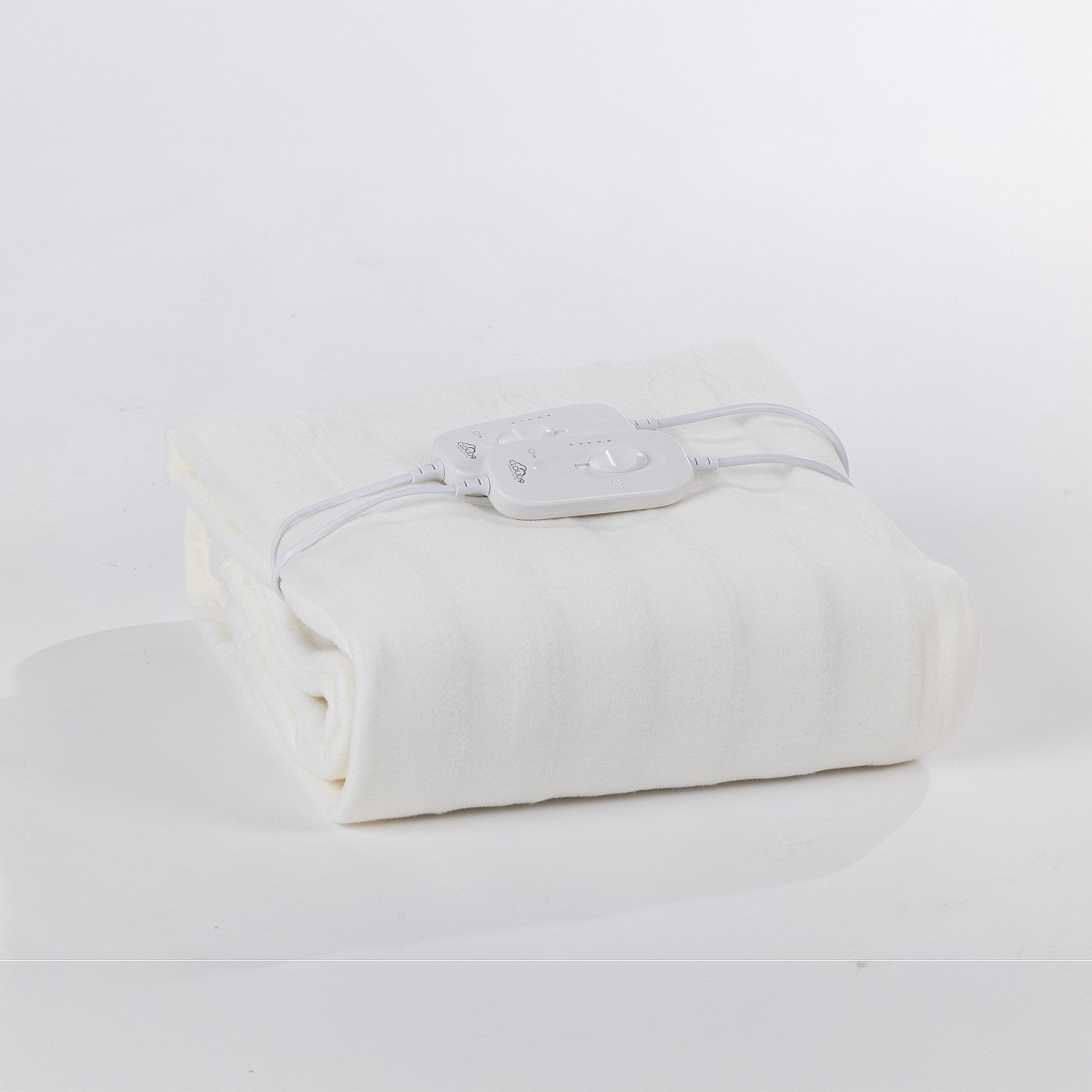 A folded electric blanket with two controllers on top. With a white background.