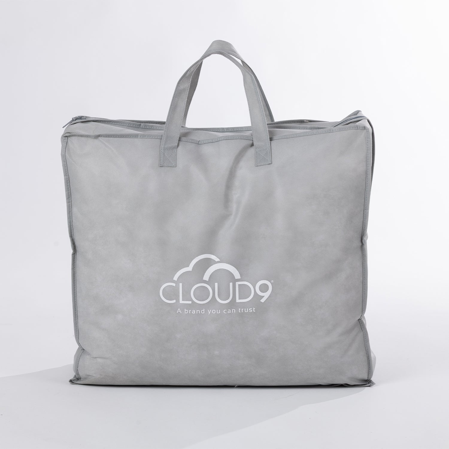 Grey Cloud 9 quilt storage bag with handles in a white background