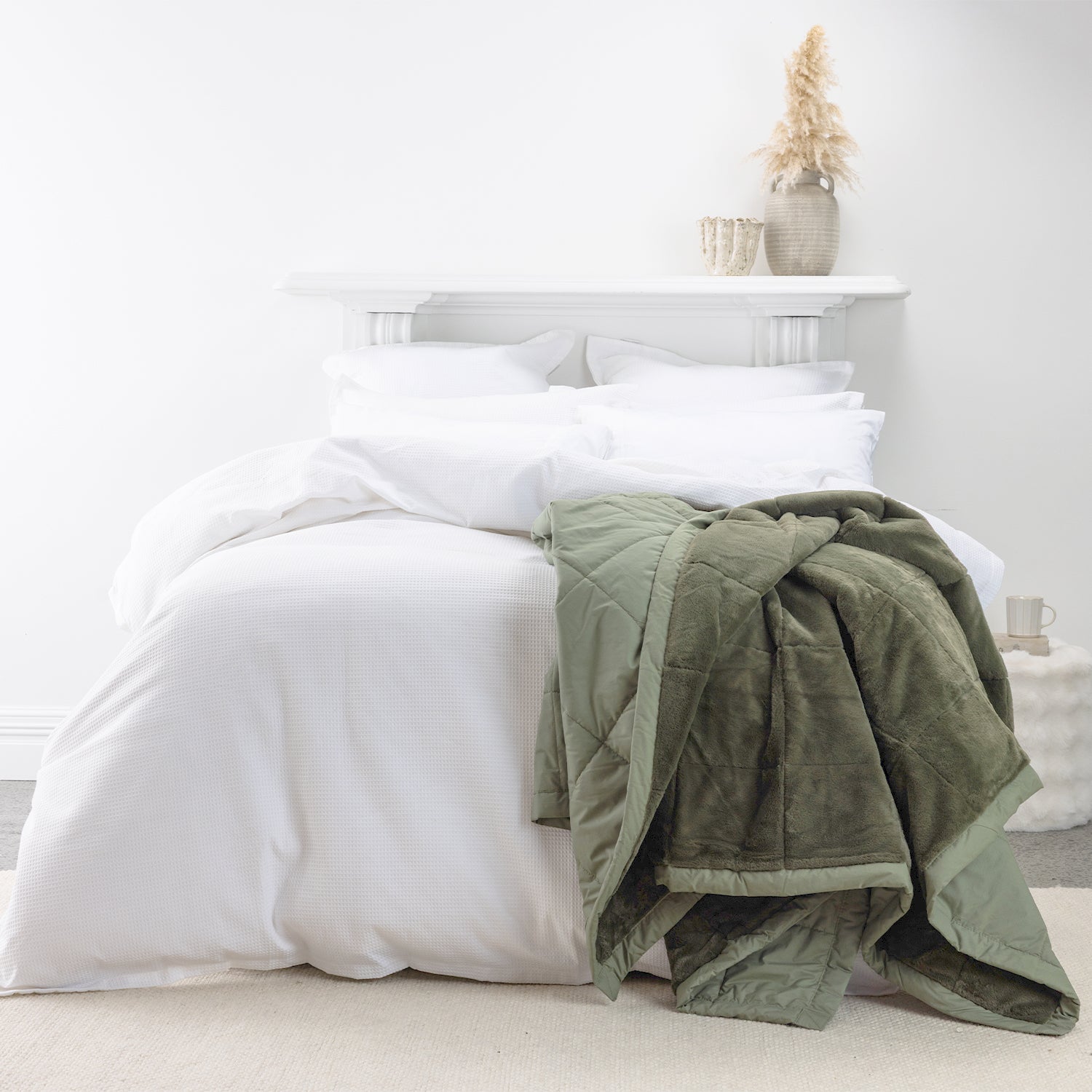 Spruce Cotton/Faux Fur Blanket on styled bed