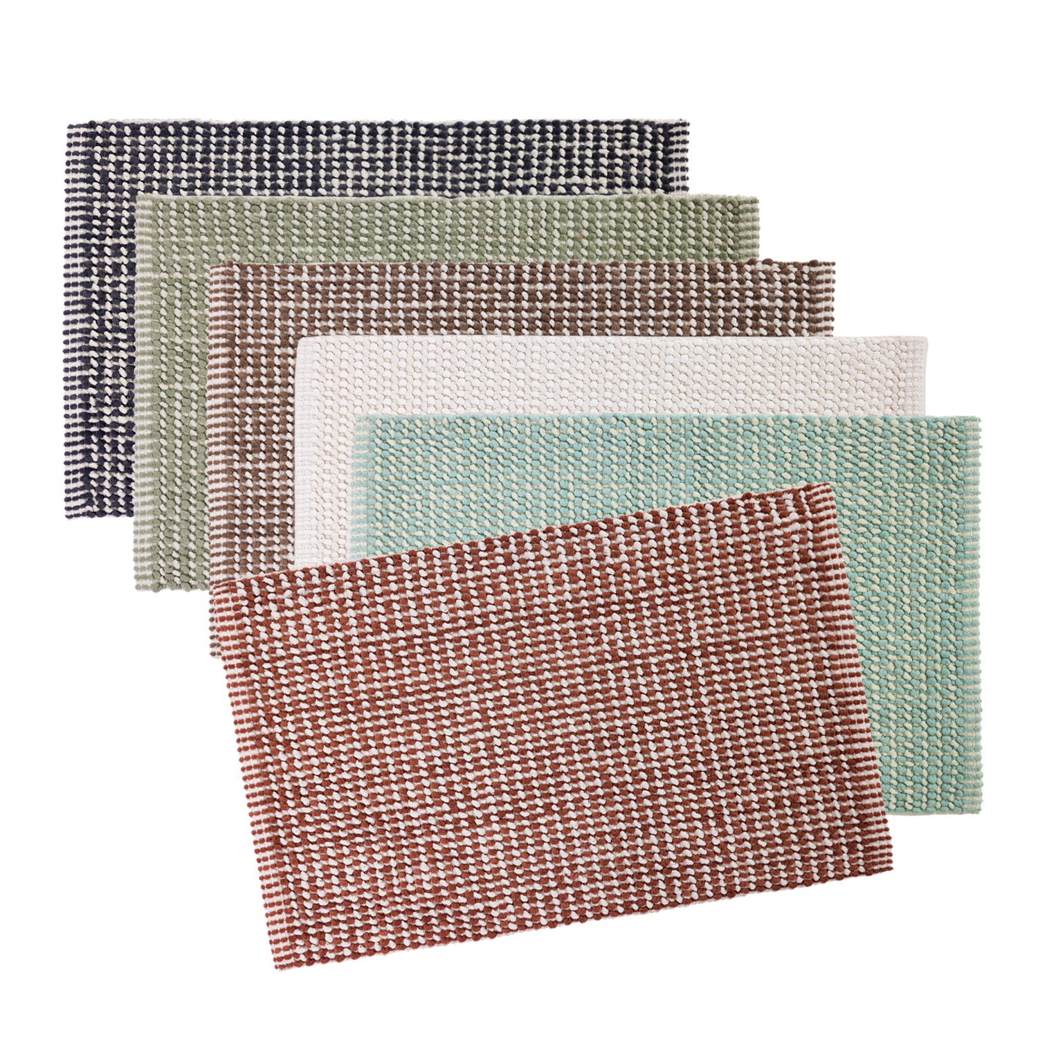 Five Home Co. Amelie Popcorn Bathmats in Ivory, Smoke, French Pear, Mocha, Sky Blue and Clay arranged in a layered stack on a white background.