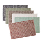Five Home Co. Amelie Popcorn Bathmats in Ivory, Smoke, French Pear, Mocha, Sky Blue and Clay arranged in a layered stack on a white background.
