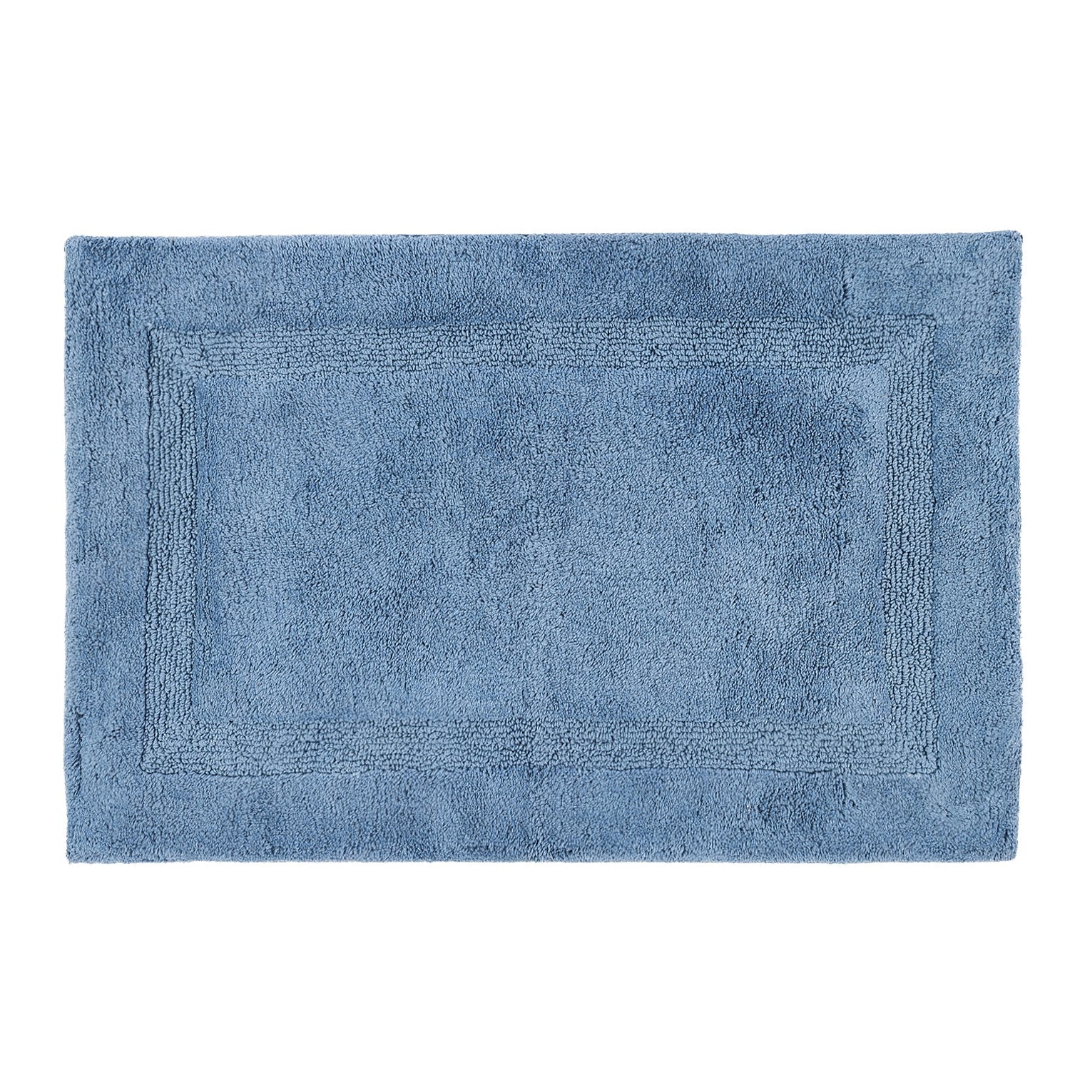 Denim bathmat featuring a plush textured finish with a subtle border design on a clean white background.
