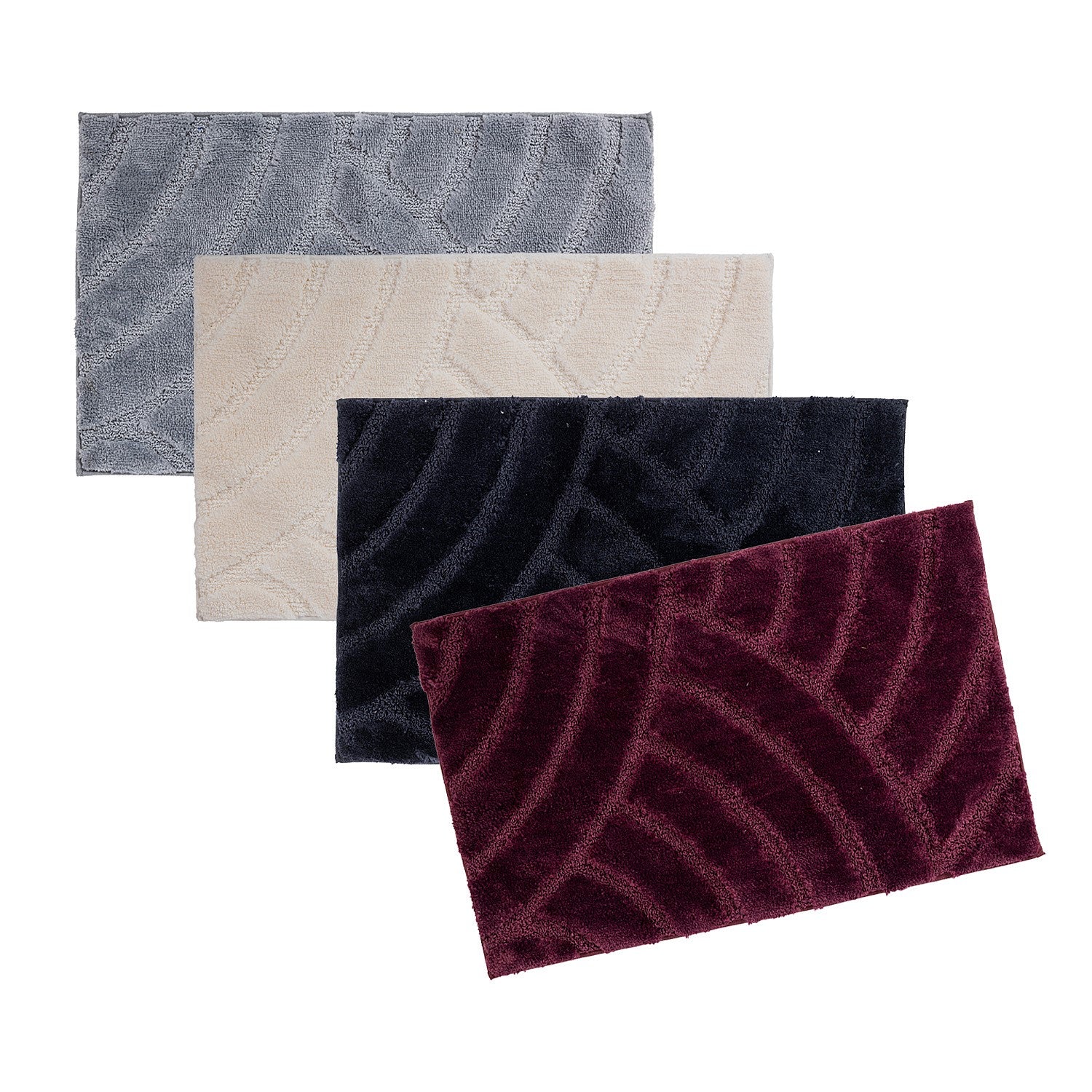 Bathmat range featuring plush carved geometric designs in berry, black, cream, and grey colourways on a clean white background.