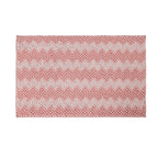 Pink bathmat featuring a soft bobble texture with a white toggle-inspired zigzag pattern on a clean white background.
