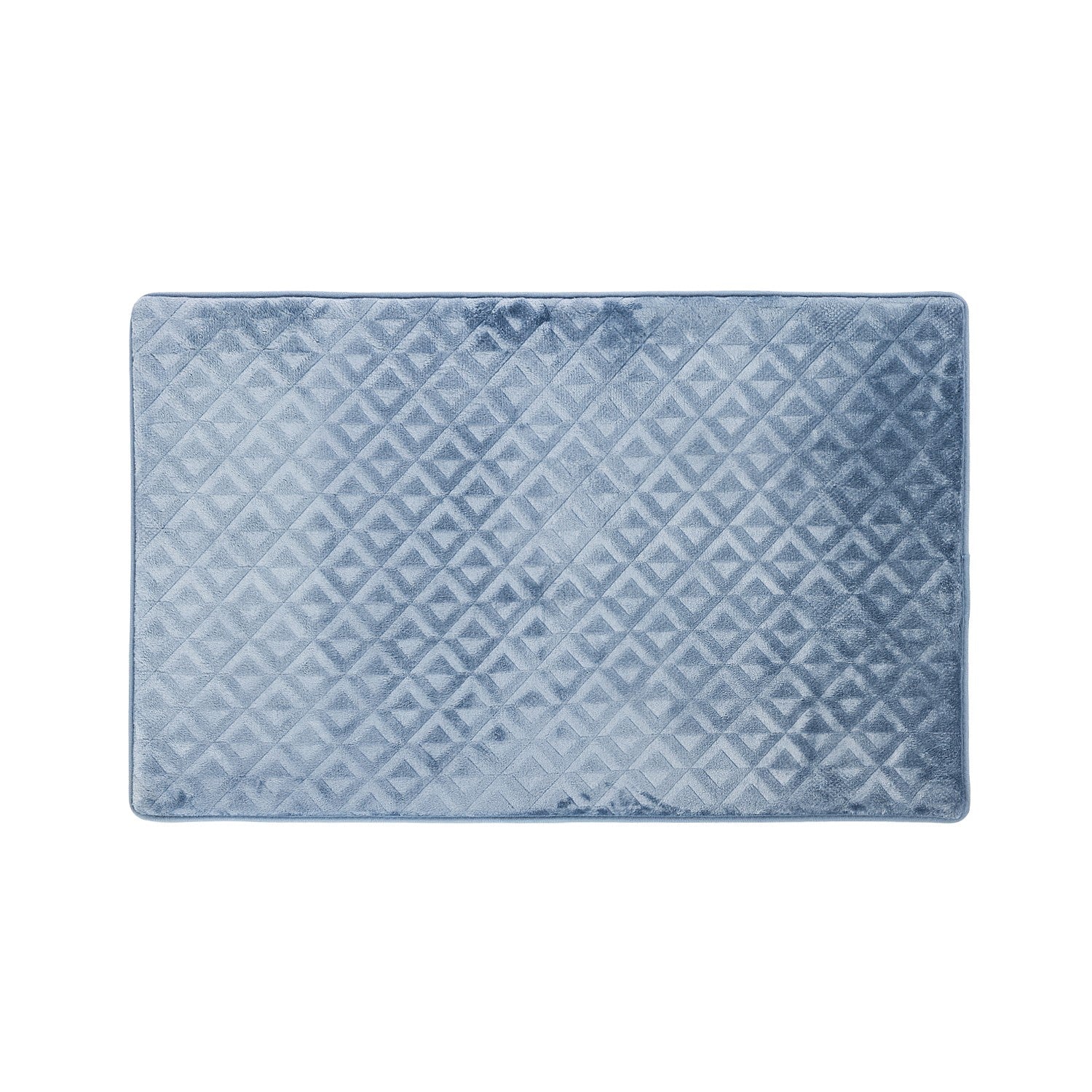 Blue bathmat featuring a soft geometric textured pattern on a clean white background.